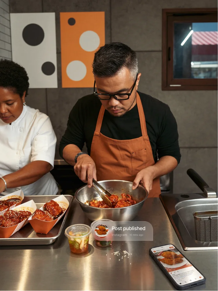 A cook plating food on the line